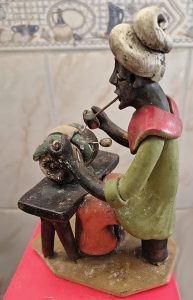 Homem trabalhando com cachimboLuiz Galdino de Caruaru, PEDécada 197018 cm de altura