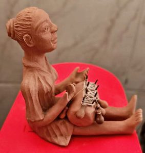 Obra a mulher do tearF. Freitas10 cm altura